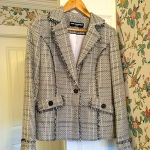 Chanel style blazer with fringe trim.